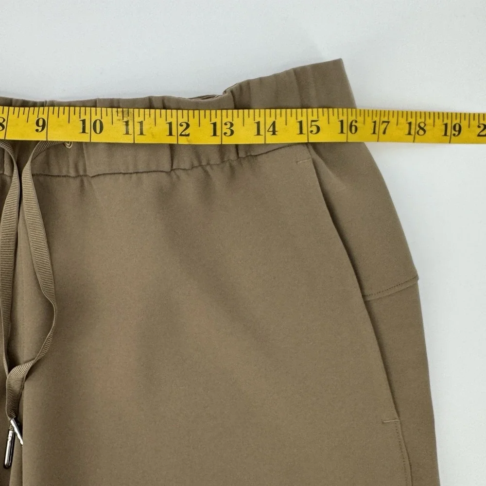 Lululemon‎ On The Fly Crop Pants Size 10 Khaki Woven Drawstring Stretch Casual